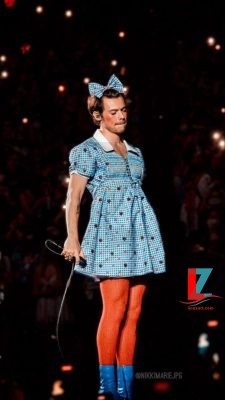 <img = “dorothy-harry.jpg” alt = “Harry transforms into character Dorothy”>